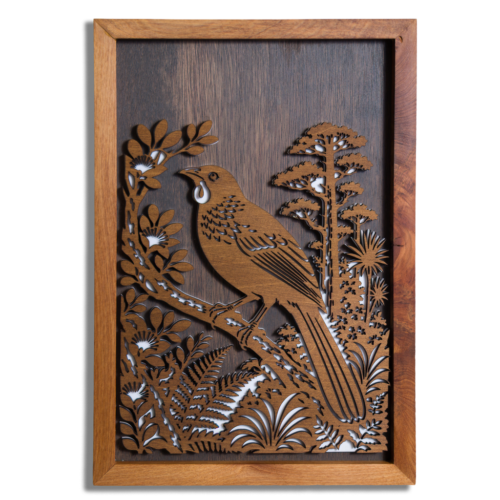 North Island kōkako layered timber wall art in a macrocarpa frame, front view