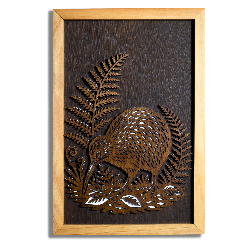 Kiwi layered timber wall art with silver fern in a macrocarpa frame, front view