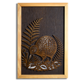 Kiwi layered timber wall art with silver fern in a macrocarpa frame, front view