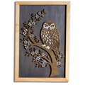 Morepork ruru layered timber wall art in a macrocarpa frame, front view