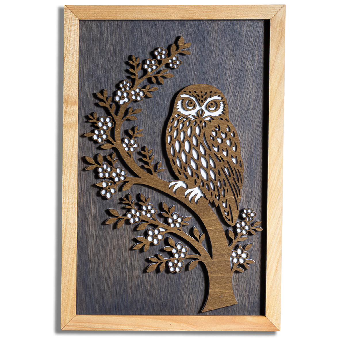 Morepork ruru layered timber wall art in a macrocarpa frame, front view