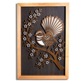 Fantail pīwakawaka layered timber wall art in a macrocarpa frame, front view