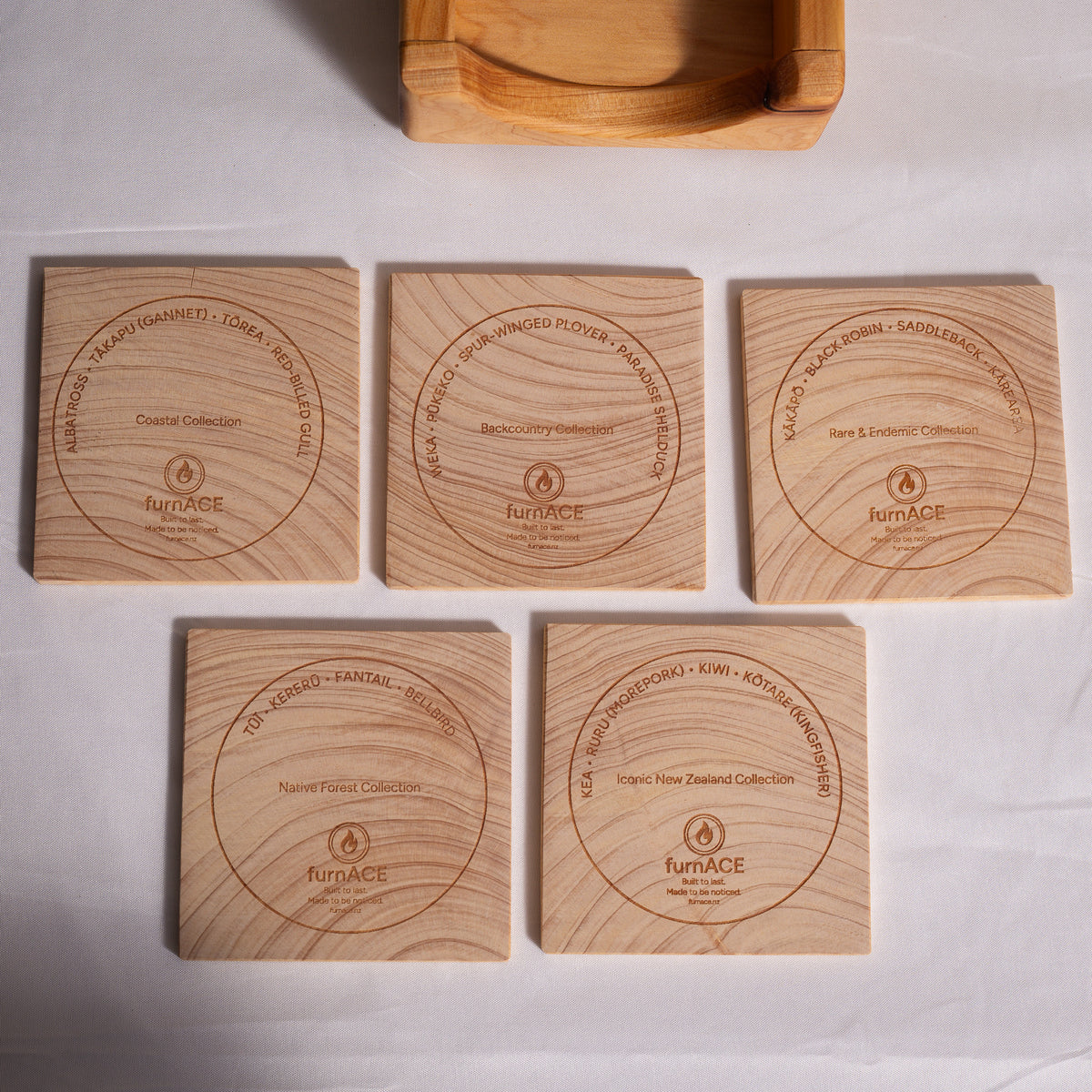 Birds of Aotearoa Coaster Set – Handmade NZ Macrocarpa Timber | Set of 5 + Holder
