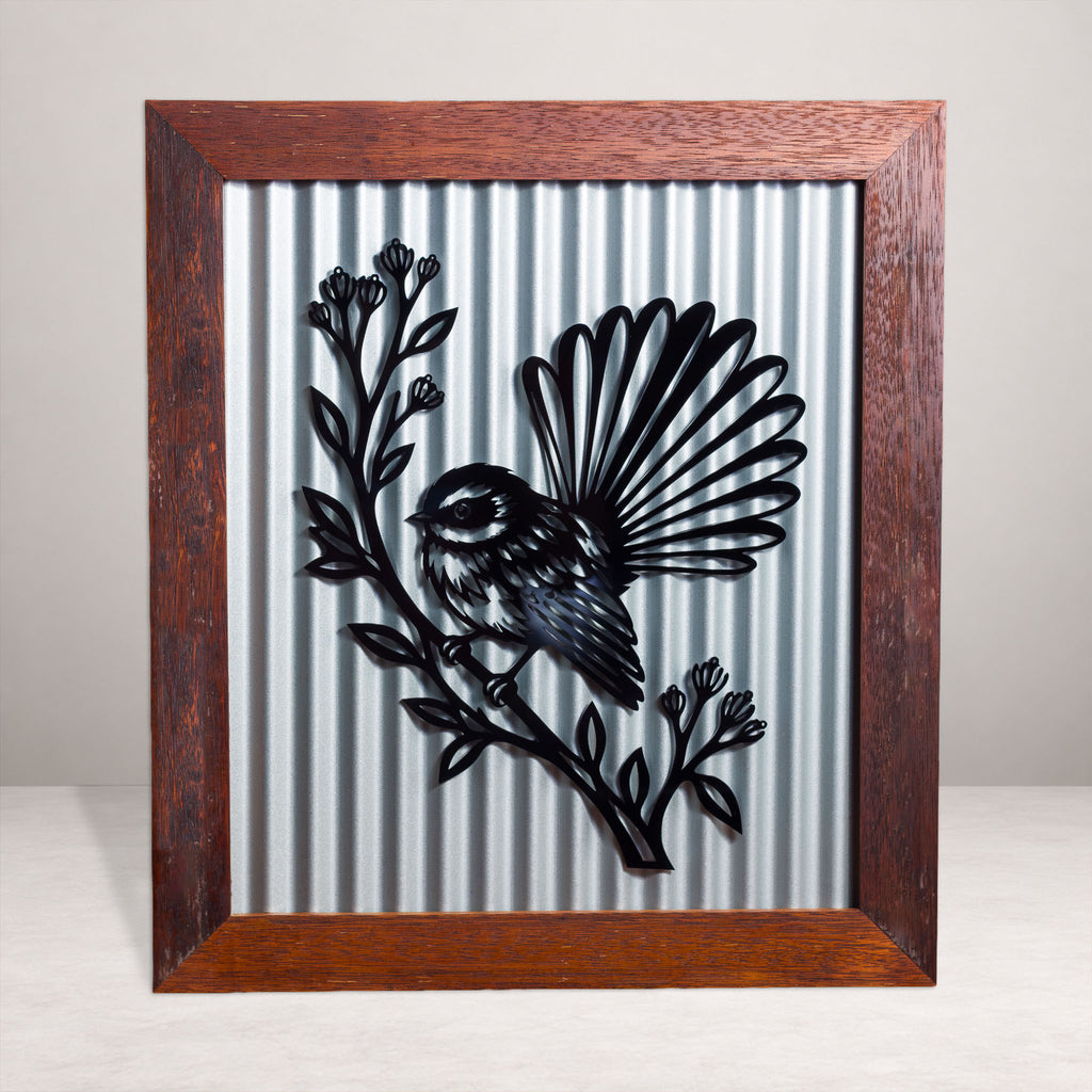 Pīwakawaka Fantail Outdoor Wall Art – Corrugated Metal & Black Acrylic – Kwila Frame