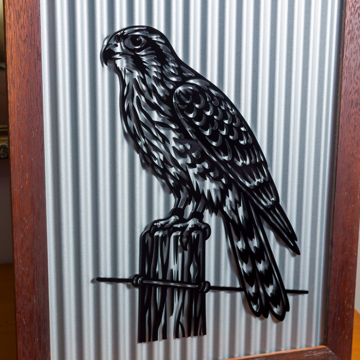 Kārearea New Zealand Falcon Outdoor Wall Art – Corrugated Metal & Black Acrylic – Kwila Frame